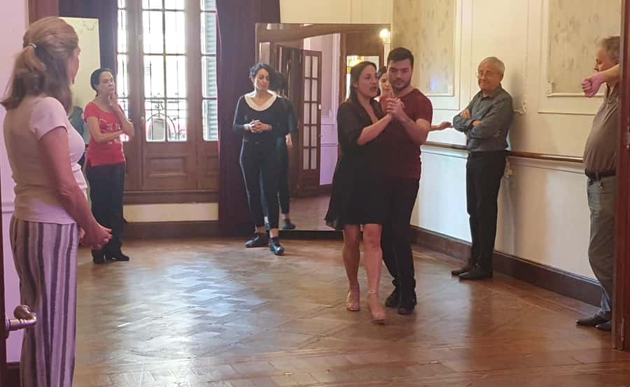 Tango Lesson in Buenos Aires with professional dancers - Where the history fits: learning the tango story inside the halls